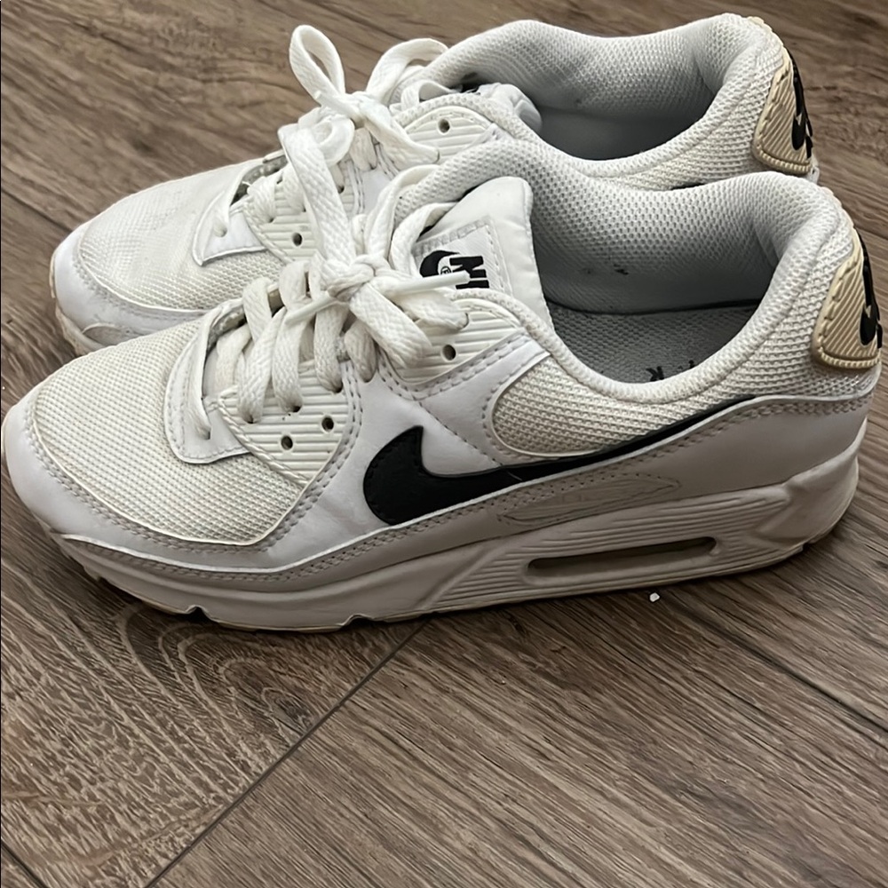 Nike women’s White and Black Sneakers